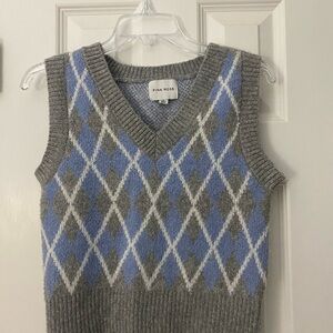 Small Pink Rose sweater vest.